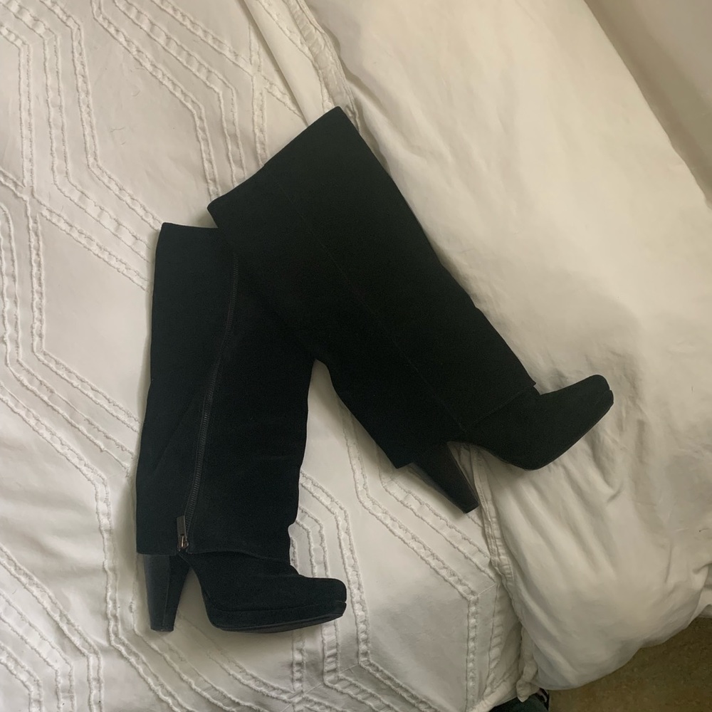 Tall fold over black leather boots